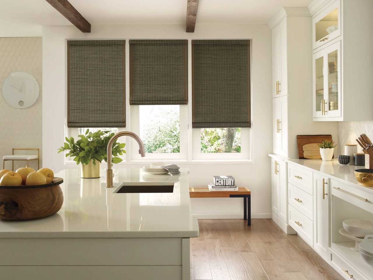 Hunter Douglas Provenance® Woven Wood Shades filtering light into a kitchen near Bulverde, TX